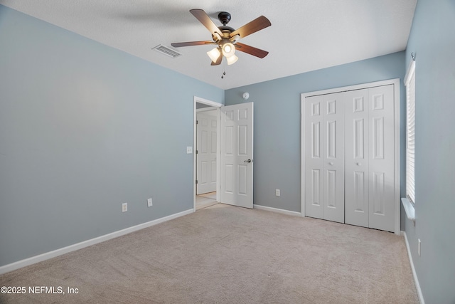 253 Bell Branch Ln, Saint Johns, FL 32259 - unfurnished bedroom featuring carpet flooring, a closet, and ceiling fan