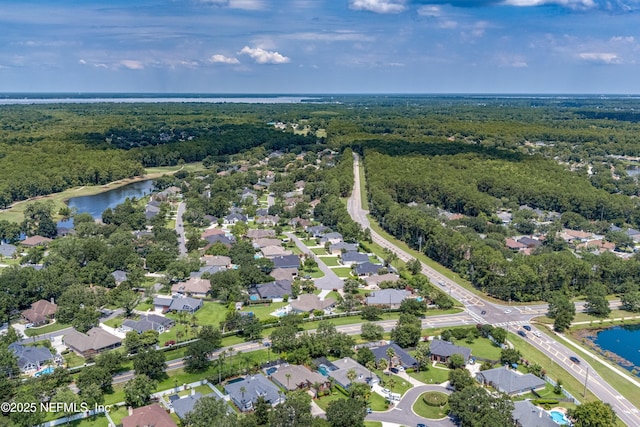 253 Bell Branch Ln, Saint Johns, FL 32259 - aerial view of property and surrounding area featuring a heavily wooded area and a nearby body of water
