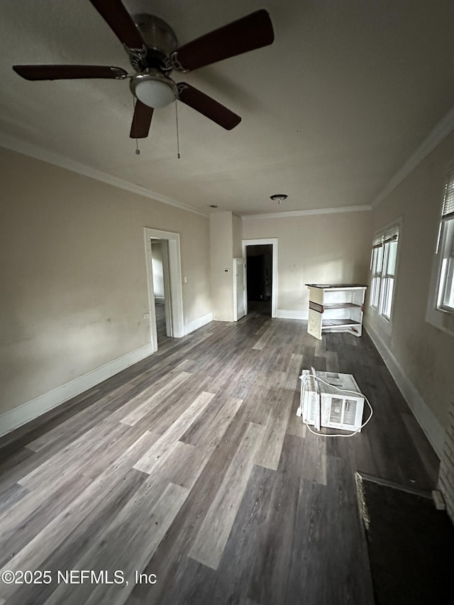 104 W 33rd St, Jacksonville, FL 32206 - unfurnished living room featuring crown molding, dark wood finished floors, and ceiling fan