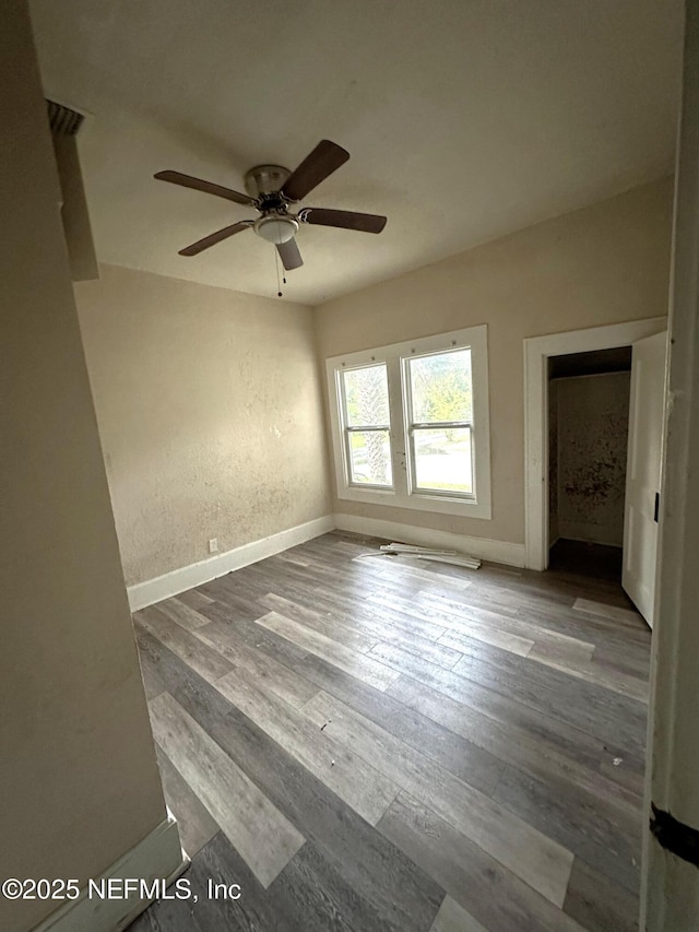 104 W 33rd St, Jacksonville, FL 32206 - empty room with ceiling fan and wood finished floors