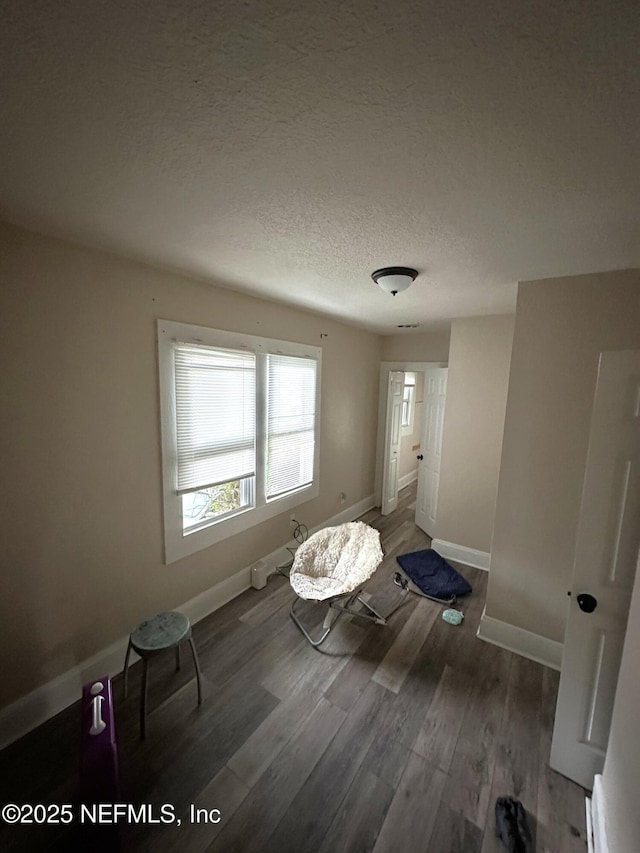 104 W 33rd St, Jacksonville, FL 32206 - bedroom with a textured ceiling and wood finished floors