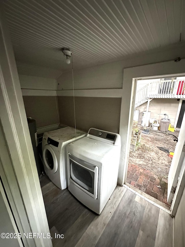 104 W 33rd St, Jacksonville, FL 32206 - laundry area featuring independent washer and dryer and wood finished floors