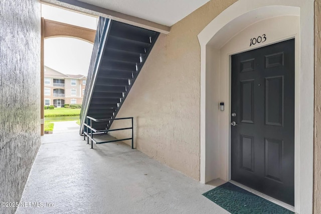 7990 Baymeadows Rd Unit 1003, Jacksonville, FL 32256 - doorway to property featuring stucco siding