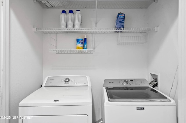 7990 Baymeadows Rd Unit 1003, Jacksonville, FL 32256 - laundry area with washer and dryer