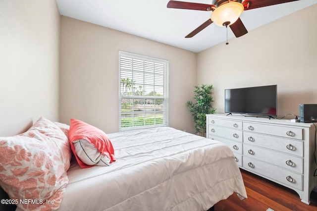 7990 Baymeadows Rd Unit 1003, Jacksonville, FL 32256 - bedroom featuring dark wood-style flooring and a ceiling fan