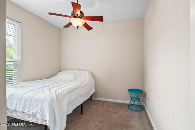 7990 Baymeadows Rd Unit 1003, Jacksonville, FL 32256 - carpeted bedroom with baseboards and ceiling fan