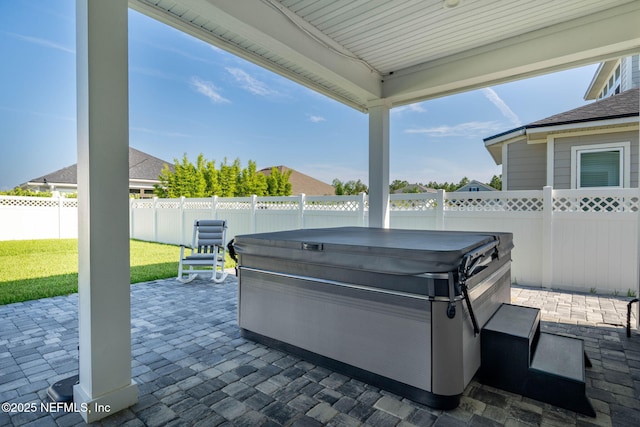50 Tartan Ct, Saint Augustine, FL 32092 - fenced backyard featuring a hot tub and a patio