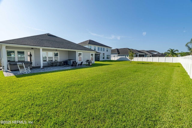 50 Tartan Ct, Saint Augustine, FL 32092 - back of house featuring a patio area and roof with shingles