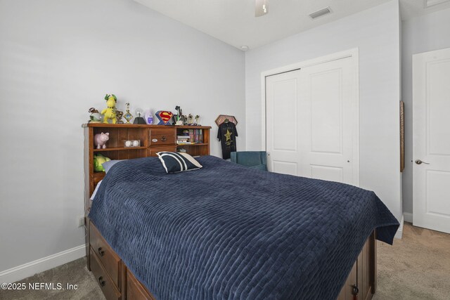 50 Tartan Ct, Saint Augustine, FL 32092 - bedroom featuring light carpet, a closet, and ceiling fan