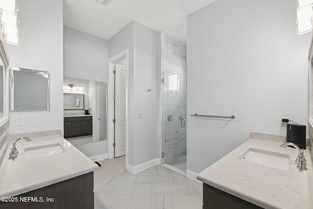 50 Tartan Ct, Saint Augustine, FL 32092 - bathroom featuring a shower stall and two vanities