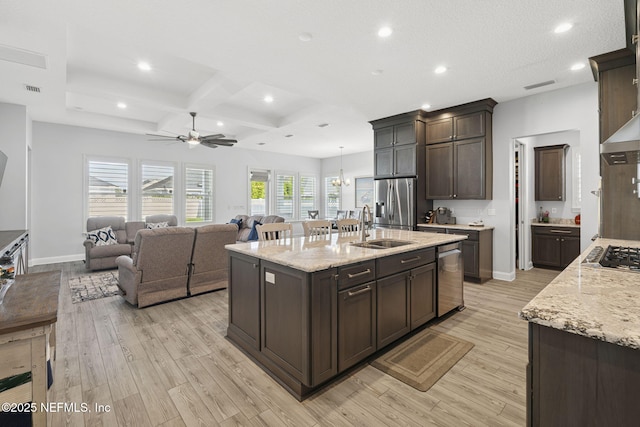 50 Tartan Ct, Saint Augustine, FL 32092 - kitchen featuring appliances with stainless steel finishes, a ceiling fan, recessed lighting, light wood-style floors, and dark brown cabinets