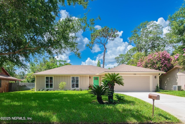 7038 Holiday Hill Ct, Jacksonville, FL 32216 - ranch-style house with a garage, concrete driveway, and board and batten siding