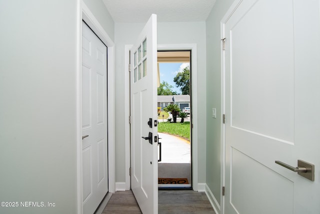 7038 Holiday Hill Ct, Jacksonville, FL 32216 - entryway with wood finished floors and baseboards
