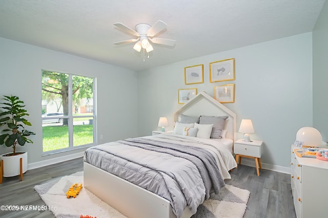 7038 Holiday Hill Ct, Jacksonville, FL 32216 - bedroom with wood finished floors and ceiling fan