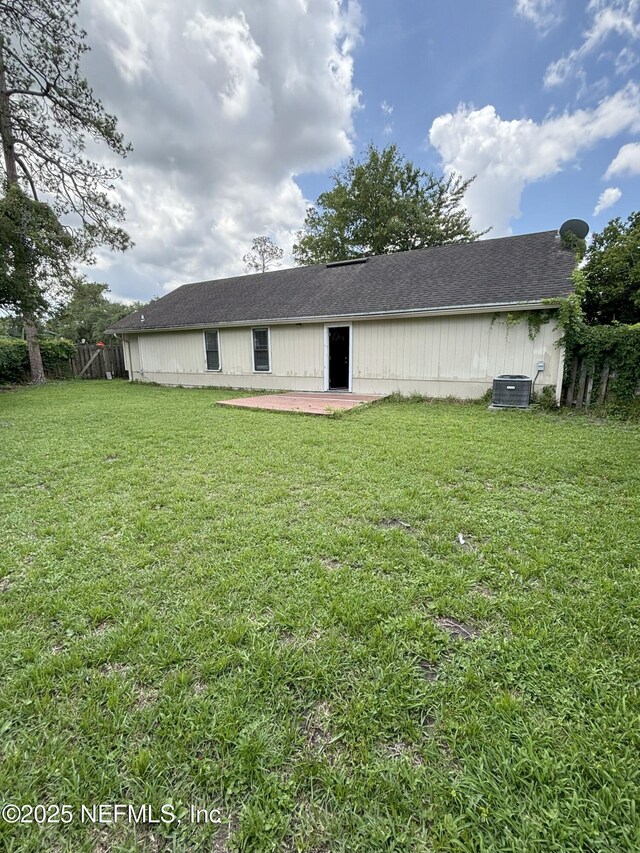 71 Naugatuck Dr, Jacksonville, FL 32225 - rear view of property featuring a patio area and roof with shingles