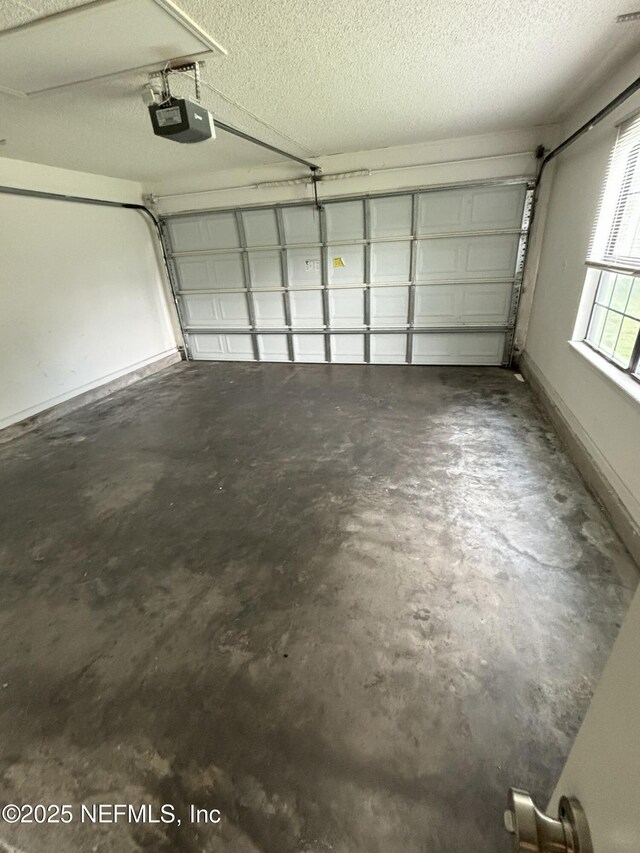 71 Naugatuck Dr, Jacksonville, FL 32225 - garage featuring a garage door opener