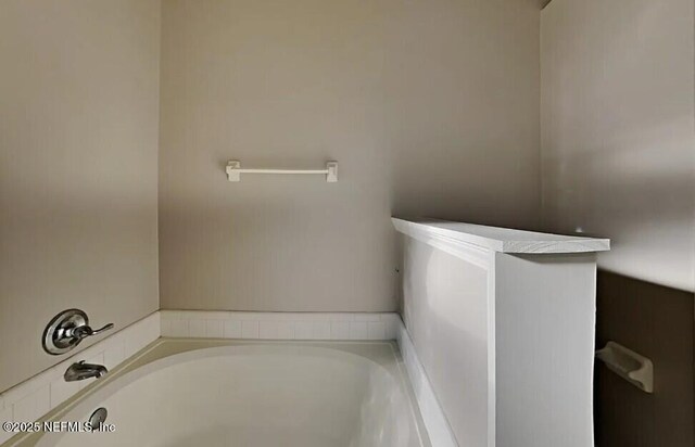 71 Naugatuck Dr, Jacksonville, FL 32225 - bathroom featuring a garden tub