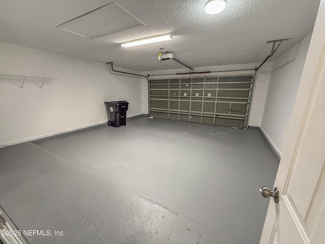 1736 Ashwood Cir, Middleburg, FL 32068 - garage with a garage door opener and baseboards