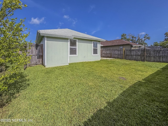 1736 Ashwood Cir, Middleburg, FL 32068 - back of property featuring a fenced backyard