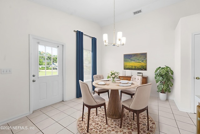 9209 Jefferson Ave, Jacksonville, FL 32208 - dining area with a chandelier and light tile patterned floors