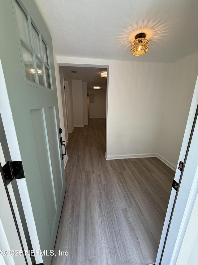 7536 Wakefield Ave, Jacksonville, FL 32208 - unfurnished room featuring wood finished floors and baseboards