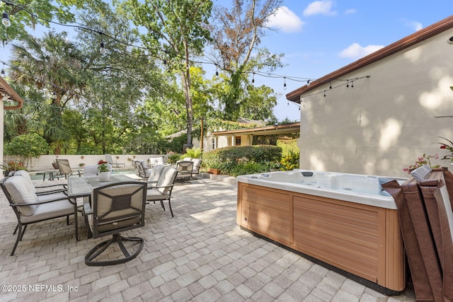1221 Oriental Gardens Rd, Jacksonville, FL 32207 - view of patio / terrace with a hot tub and outdoor dining space