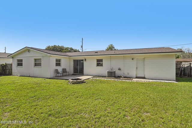 6405 Simca Dr, Jacksonville, FL 32277 - rear view of property featuring an outdoor fire pit and a patio