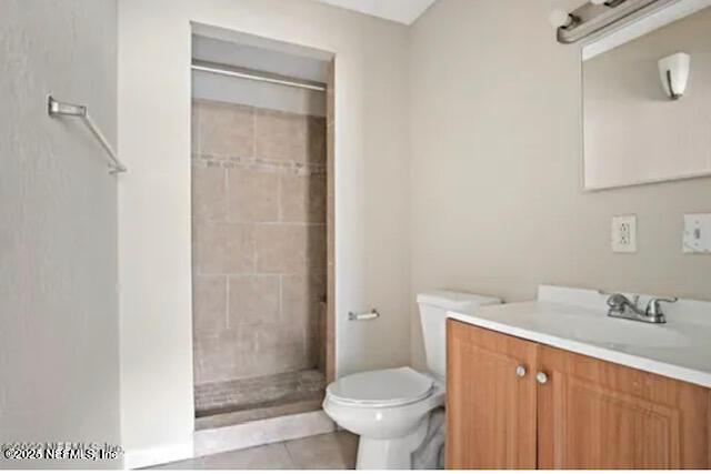 8764 3rd Ave, Jacksonville, FL 32208 - full bath featuring tiled shower, vanity, and tile patterned floors