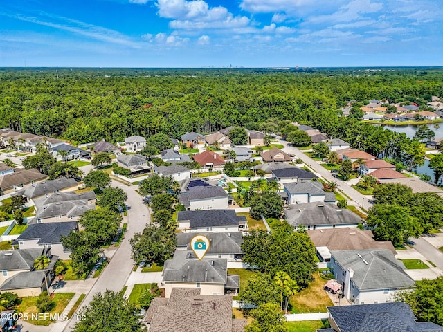 12191 Wynnfield Lakes Cir, Jacksonville, FL 32246 - aerial perspective of suburban area with a heavily wooded area