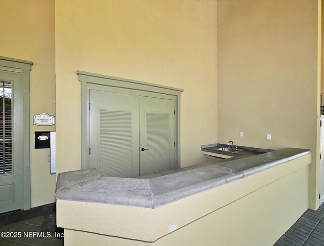 12191 Wynnfield Lakes Cir, Jacksonville, FL 32246 - bathroom with tile patterned flooring and a towering ceiling