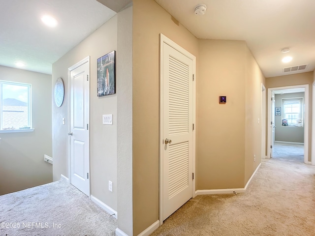 132 Yellowfin Dr, Saint Augustine, FL 32095 - corridor featuring light colored carpet