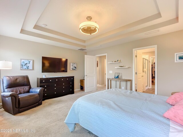 132 Yellowfin Dr, Saint Augustine, FL 32095 - bedroom featuring a raised ceiling and light colored carpet