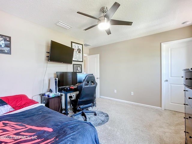 132 Yellowfin Dr, Saint Augustine, FL 32095 - bedroom with light carpet, a ceiling fan, a textured ceiling, and an office area