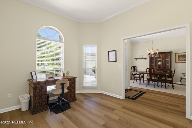 6992 Tonga Dr, Jacksonville, FL 32216 - office space featuring wood finished floors, a chandelier, and ornamental molding