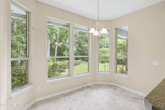 6992 Tonga Dr, Jacksonville, FL 32216 - unfurnished dining area with a chandelier and plenty of natural light