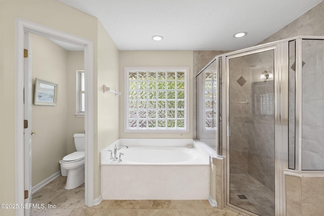 6992 Tonga Dr, Jacksonville, FL 32216 - full bathroom with a garden tub, a shower stall, and recessed lighting