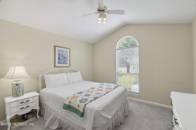 6992 Tonga Dr, Jacksonville, FL 32216 - bedroom with light carpet, lofted ceiling, a textured ceiling, and ceiling fan