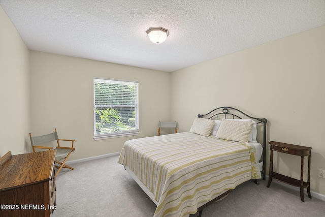 6992 Tonga Dr, Jacksonville, FL 32216 - bedroom with carpet floors and a textured ceiling