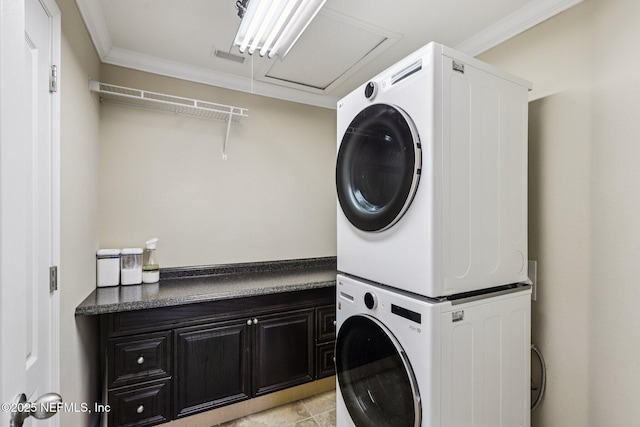 738 W Kings College Dr, Fruit Cove, FL 32259 - laundry room with stacked washer / dryer, cabinet space, and ornamental molding