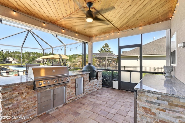 738 W Kings College Dr, Fruit Cove, FL 32259 - sunroom featuring area for grilling, a ceiling fan, and rail lighting