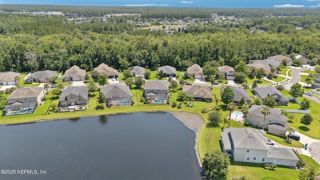 738 W Kings College Dr, Fruit Cove, FL 32259 - aerial view of residential area with a heavily wooded area and a nearby body of water