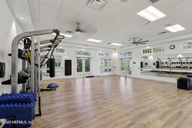 738 W Kings College Dr, Fruit Cove, FL 32259 - exercise room with ceiling fan, wood finished floors, and a paneled ceiling