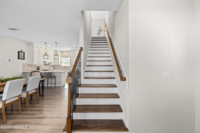 111 Beam Ln, Saint Augustine, FL 32095 - staircase featuring wood finished floors and recessed lighting