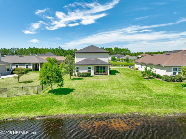 111 Beam Ln, Saint Augustine, FL 32095 - back of house featuring a water view, a residential view, and roof with shingles