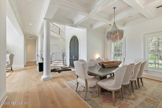 24736 Harbour View Dr, Ponte Vedra Beach, FL 32082 - dining space with a chandelier, light wood-type flooring, beam ceiling, coffered ceiling, and crown molding