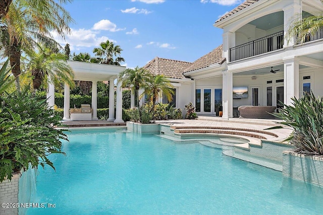 24736 Harbour View Dr, Ponte Vedra Beach, FL 32082 - swimming pool featuring french doors, a patio, and ceiling fan