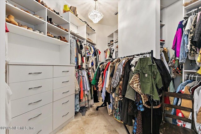 24736 Harbour View Dr, Ponte Vedra Beach, FL 32082 - spacious closet with a chandelier