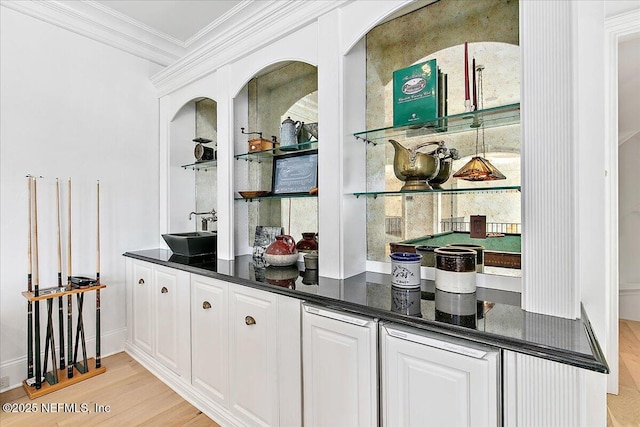 24736 Harbour View Dr, Ponte Vedra Beach, FL 32082 - bar featuring light wood finished floors and ornamental molding