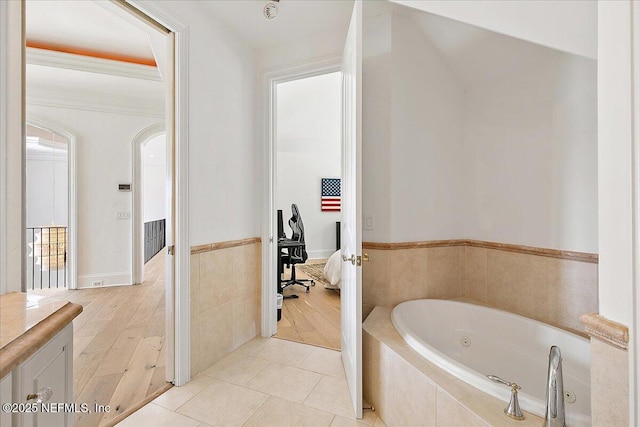 24736 Harbour View Dr, Ponte Vedra Beach, FL 32082 - bathroom with a tub with jets, vanity, and tile patterned floors