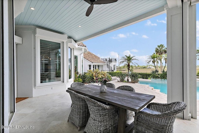 24736 Harbour View Dr, Ponte Vedra Beach, FL 32082 - view of patio / terrace with a ceiling fan, an outdoor pool, and outdoor dining space